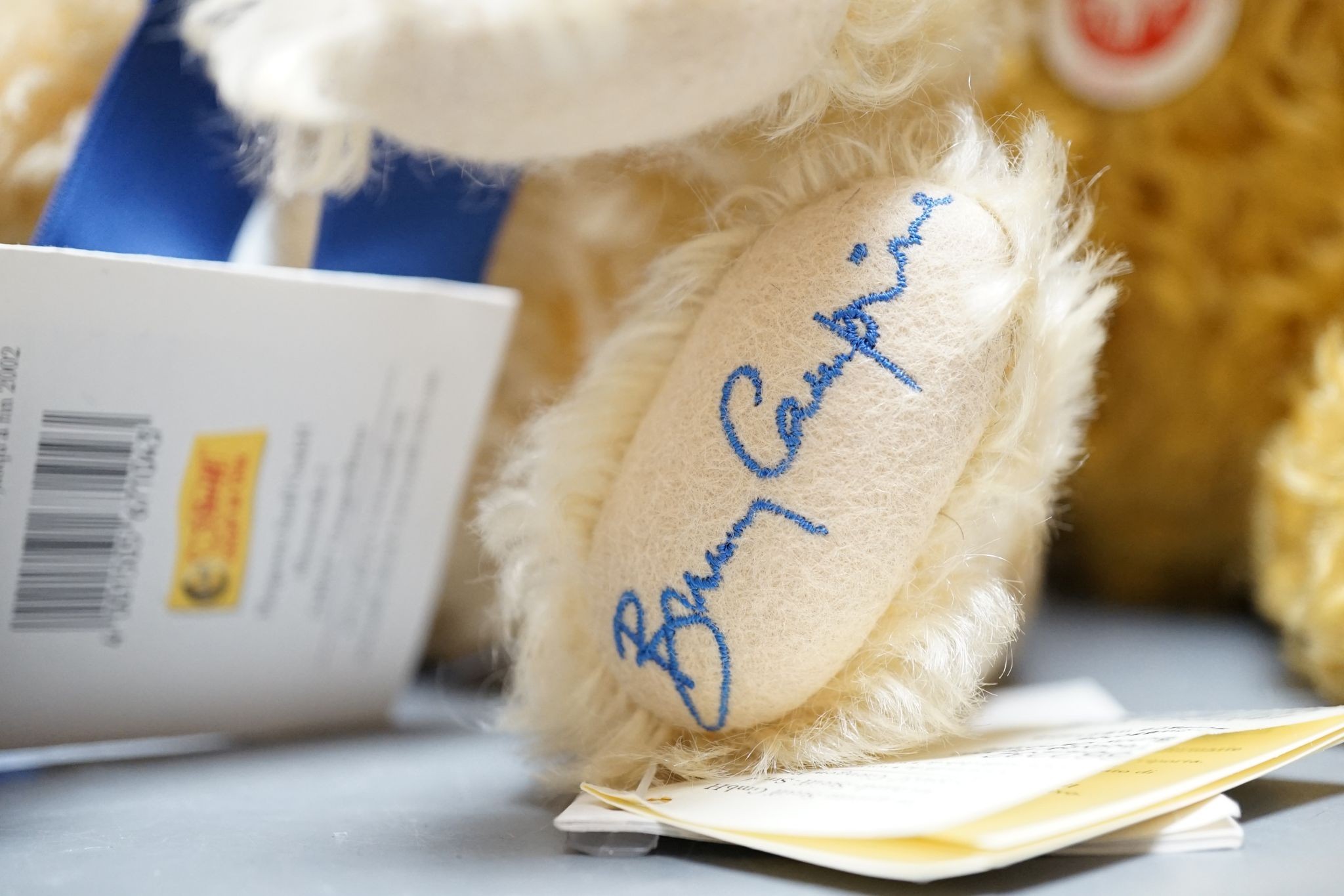 A Side-To-Side Steiff bear, white label, 35cm, box / certificate, together with an Anniversary Bear Box 25cm. a Steiff Bunny Campione bear with box and certificate, 28cm